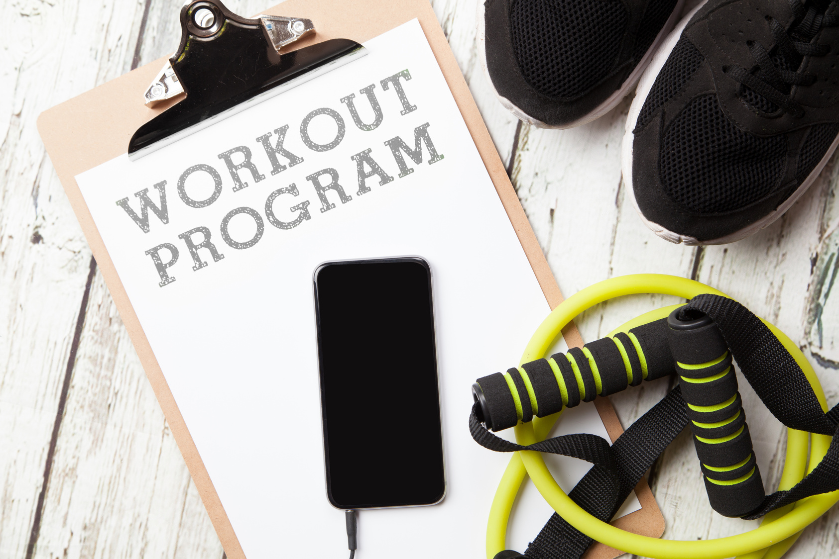 Workout program pictured with fitness equipment